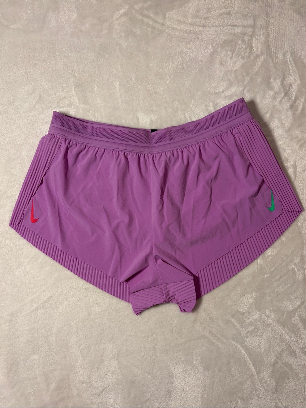 Nike Purple Women's Athletic Running Shorts with Dual Swoosh Accents
